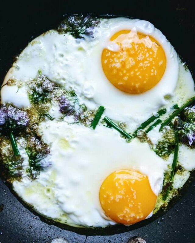 Eggs with wild chive flowers